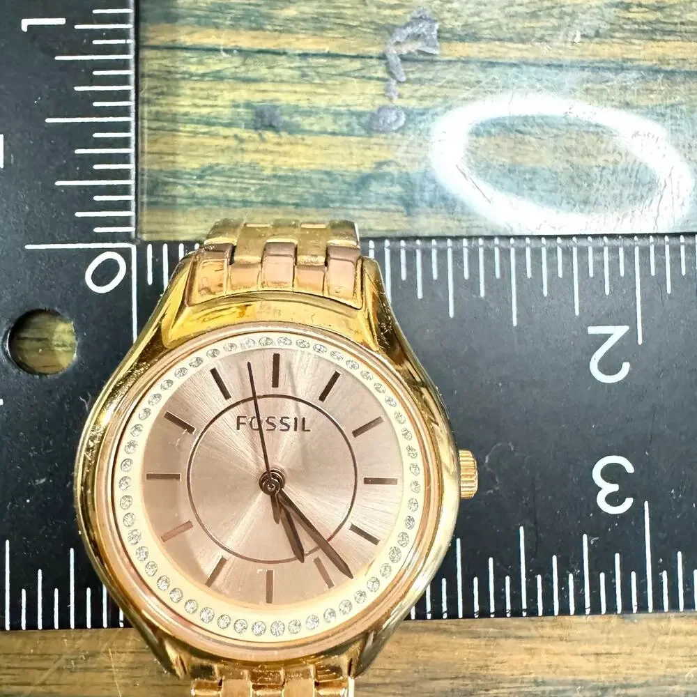 Fossil Women’s Gold Tone Quartz Watch Rose Gold Tone Dial Rhinestone Bracelet